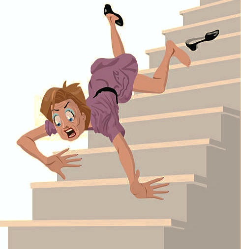 Woman falls from stairs.